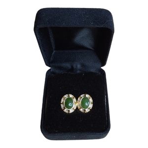 1 Women's Gold Earrings With Green Stone.